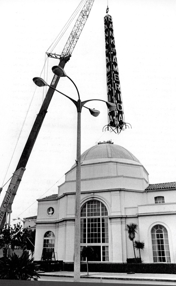 When the Janss Investment Co built its Janss Dome building at 1099 Westwood Blvd. A strikingly tall tower topped it, which lasted until either 1969 to 1977 (I found two dates.) I’d imagine it was quite a process to unbolt it from the building and lift it off with that crane.