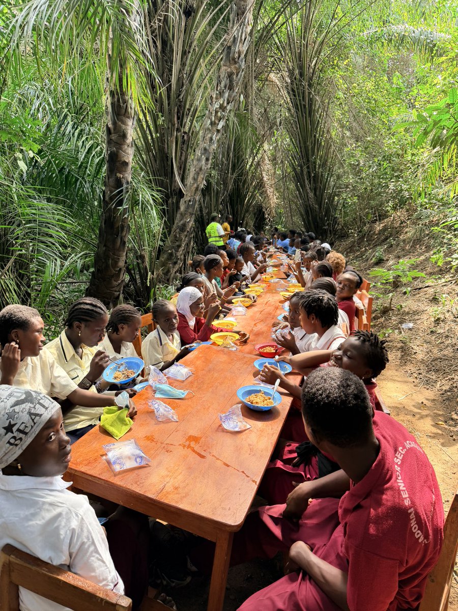 CenterMemory's tweet photo. After their community service of cleaning Robis Village on this first official National Remembrance Day students gathered in the Palmwine Corner for a meal. We are grateful to @ATJLF_ for supporting our efforts over the years towards a Remembrance Day in Sierra Leone. https://t.co/R9W0B6KZqF