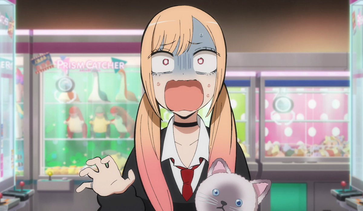 Even the kitty plushie looks surprised after Marin's picture was stolen by her friends! 💛