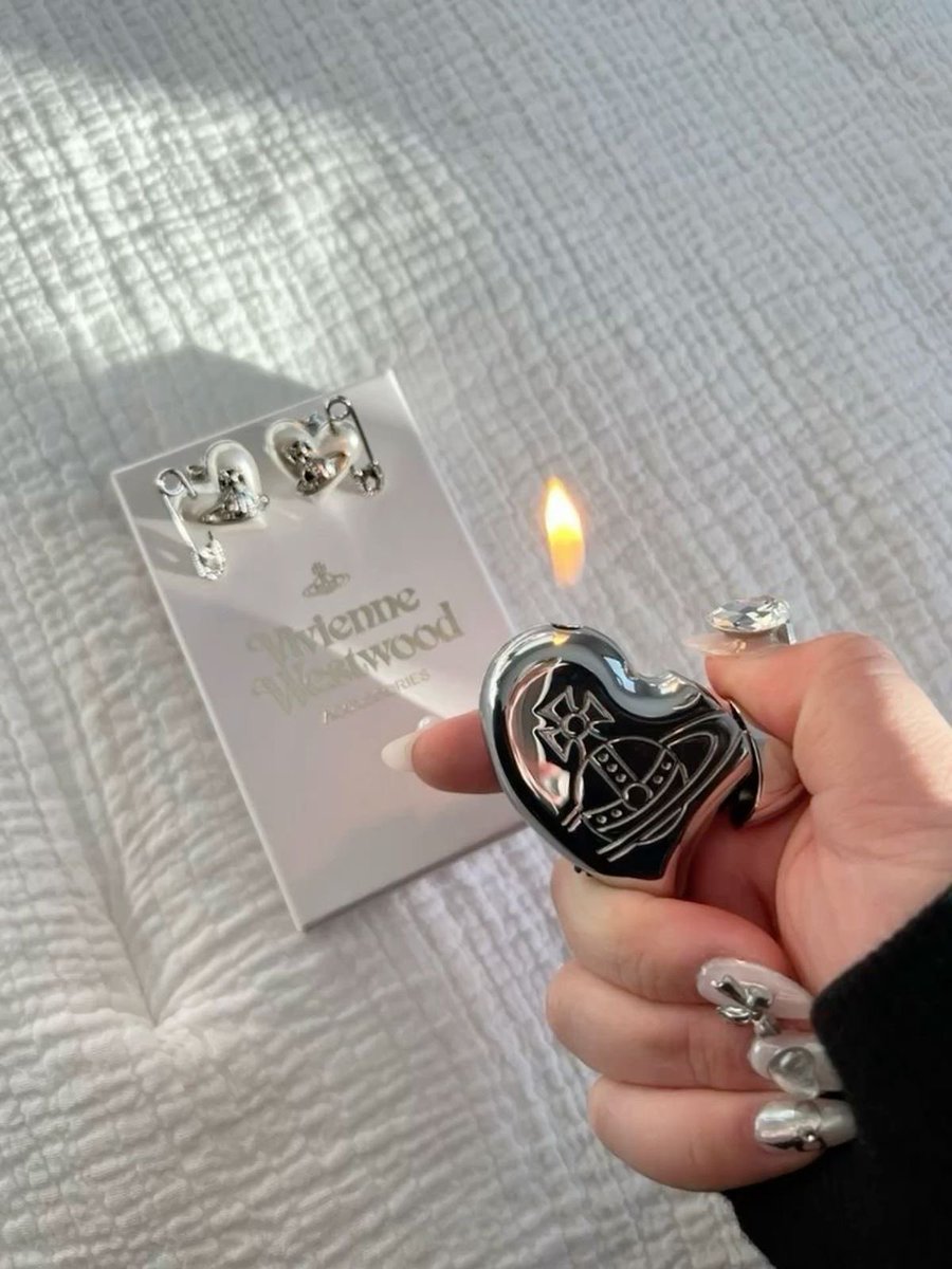 Hellokraze's tweet image. vivienne westwood lighter