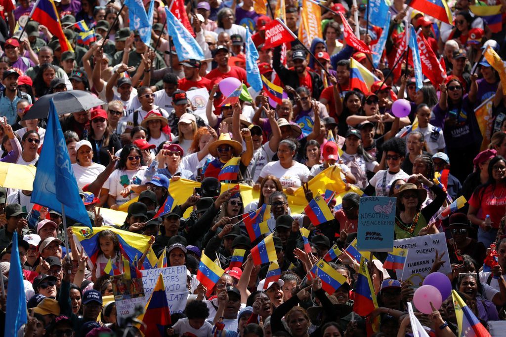 In pictures: Massive crowds of people in Venezuela's capital Caracas march in display of support for government of abducted President Nicolas Maduro and his wife Cilia Flores
