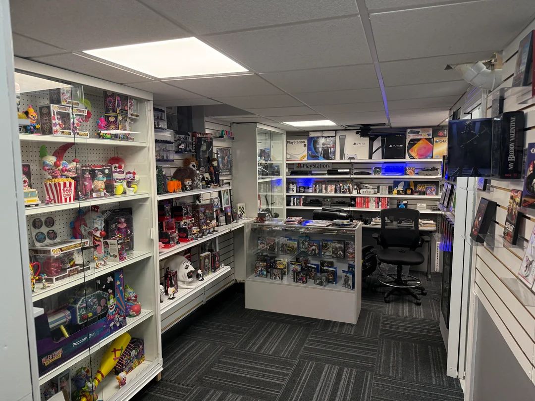 Dexerto's tweet image. A game collector built a replica GameStop in his basement to use as storage for his collection