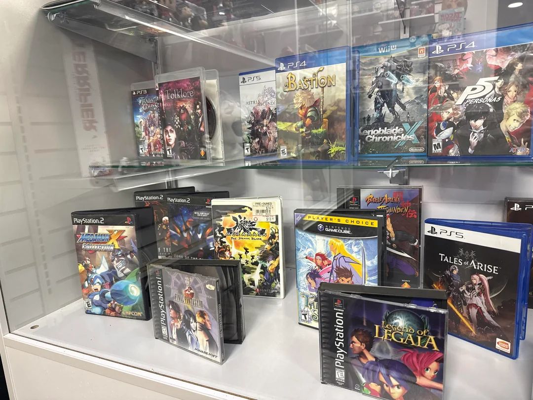 Dexerto's tweet image. A game collector built a replica GameStop in his basement to use as storage for his collection