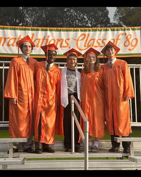 The graduation gowns are also not supposed to be orange. They are living in a mirrored Vecna world #conformitygate