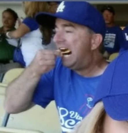 snidog's tweet photo. People talk about Dodger Stadium being scary and Dodger fans being the worst, but when I think of Dodger fans at Dodger Stadium, I think of this couple who texted my brother their selfie just because he looked so good in the background. #BestFansInBaseball #nachos