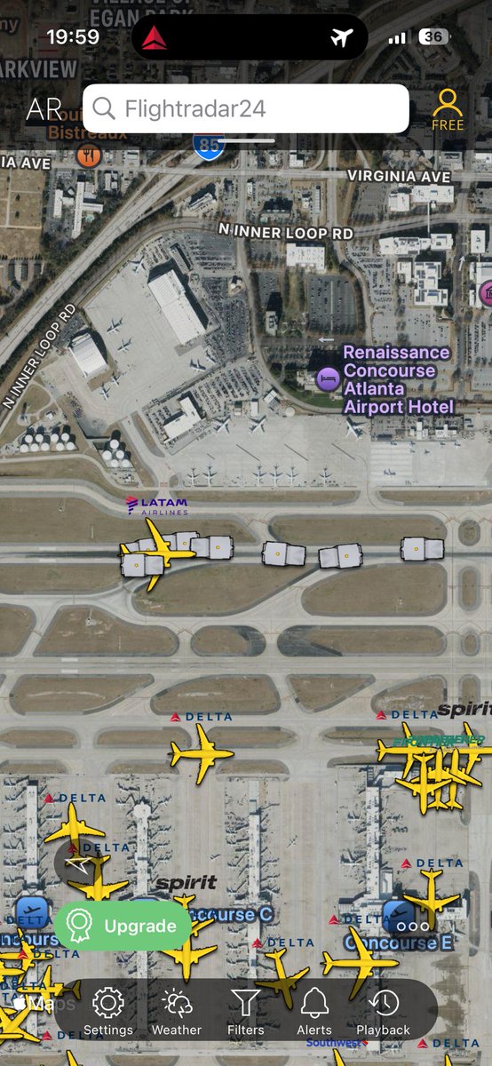 dompallo's tweet photo. Some sort of emergency going on at KATL Atlanta Airport involving a Latam 767 https://t.co/IfRhaAh3yJ