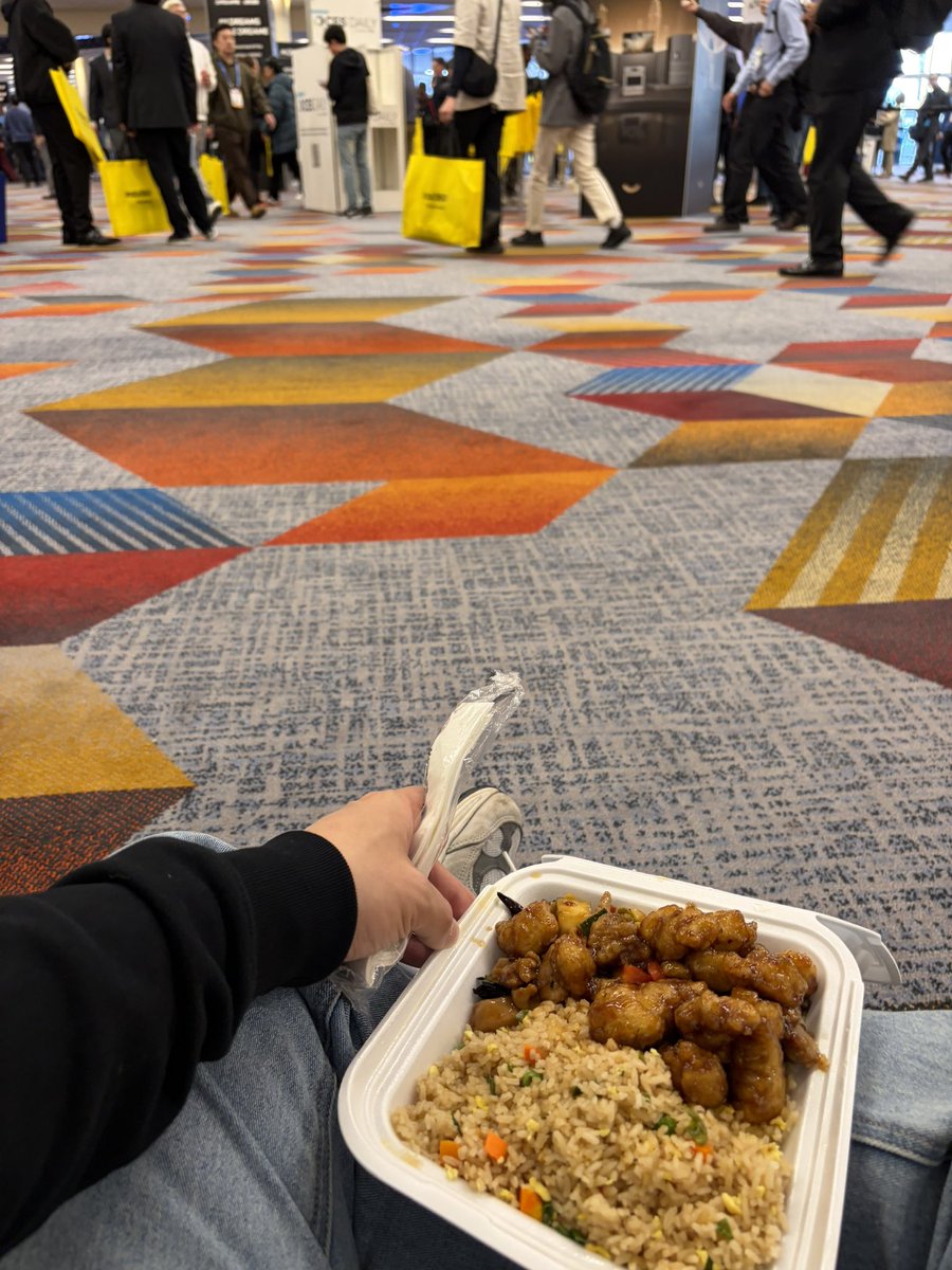 yesleocan's tweet photo. CES Day 1: No time to waste. 🚀
We’ve been so busy that we didn't even have time for a proper meal—just a quick bite sitting on the lobby floor. We managed to squeeze in meetings with about 50 different teams today alone.
#CES2026 #MANYFAST https://t.co/d96AHBzcYG