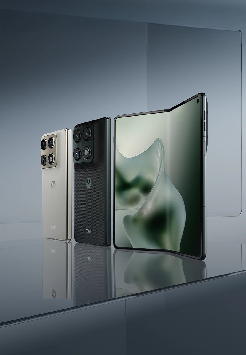 sondesix's tweet photo. Meet the new razr Fold, Motorola's first book-style foldable phone.

• 6.56" cover screen, 8.09" 2K LTPO inner screen
• Supports the Moto Pen Ultra stylus
• Triple 50 MP rear camera system, including a periscope telephoto lens with 3x optical zoom
• Dolby Vision video recording support
• 32 MP cover camera, 20 MP inner screen camera
• Moto AI features with some foldable-exclusive features

Colour options:
• PANTONE Blackened Blue
• PANTONE Lily White

Pricing and availability will be announced later.