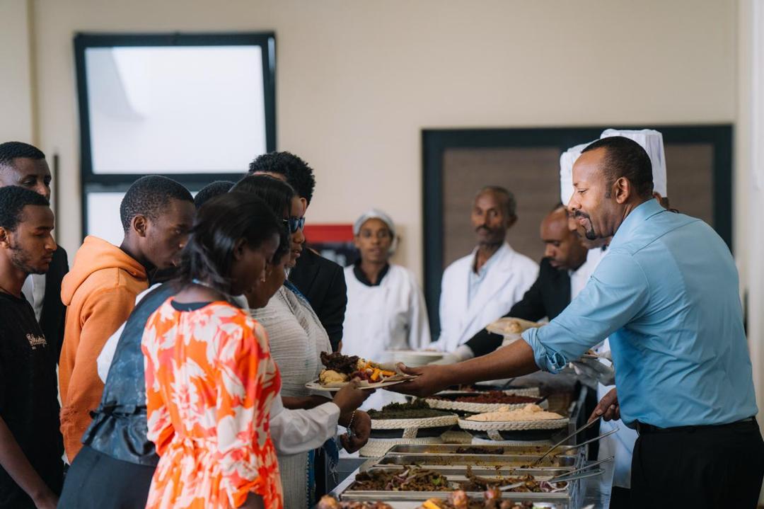 AbiyAhmedAli's tweet photo. On the blessed occasion of Ethiopian Christmas (Genna), First Lady Zinash Tayachew and I were honored to share a holiday meal with the students of the Sheikha Fatima Bint Mubarak School for the Blind. Spending this special morning together was a powerful reminder of the true meaning of the spirit of Genna.