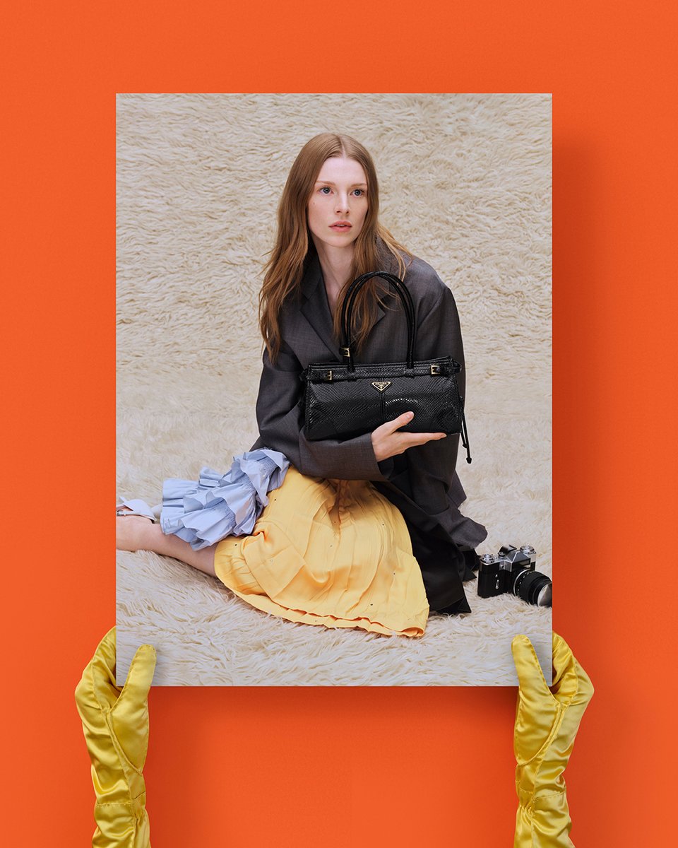 Prada's tweet image. In “Image of an Image”, photographs featuring the new Prada Spring/Summer 2026 collection are held as object, observed, re-photographed. Prada Ambassador Hunter Schafer stars in the new campaign. 
Explore the campaign: tinyurl.com/5dbbu7m6

Creative Directors: #MiucciaPrada…