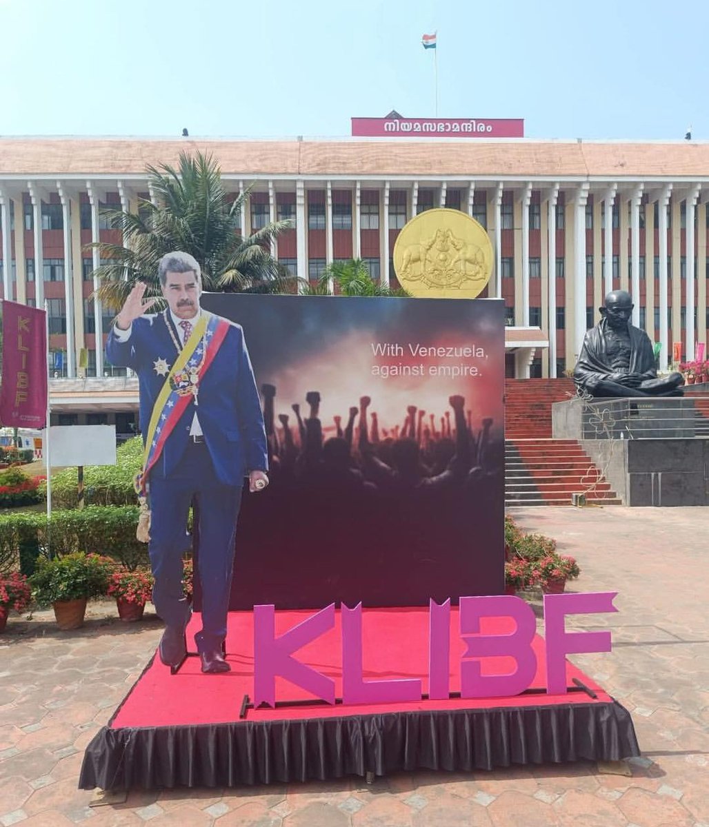 Poster outside the Kerala legislative assembly showing solidarity with Venezuela as part of the Kerala Legislative international book festival in Trivandrum.