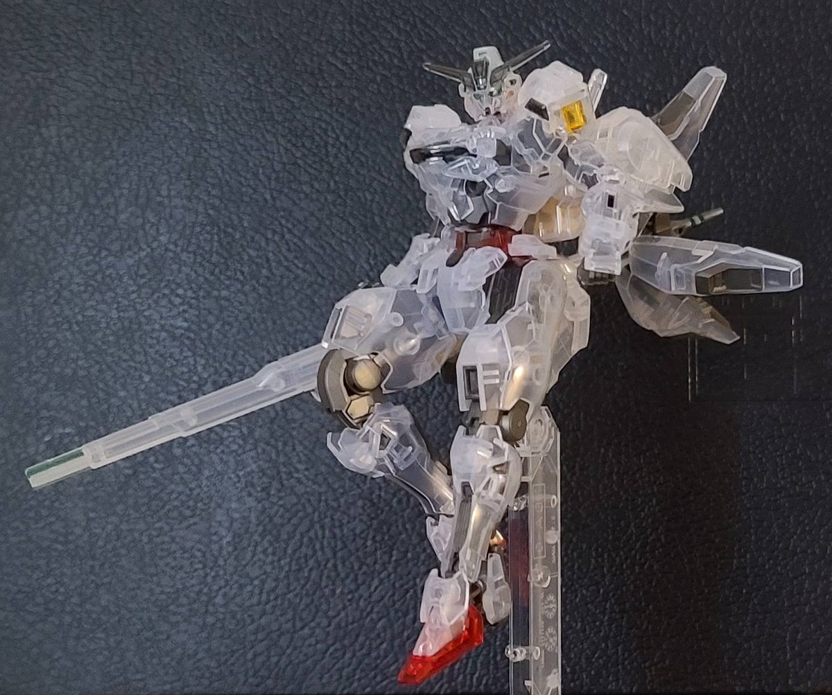 Finished building the HG Calibarn (clear colors) last night. I did take a pic before going to bed, but wanted to take a better one in the morning. Used an old sketchbook as a backdrop. Will try more poses later.

The kit was a gift from a friend, so thank you friend!

#gunpla