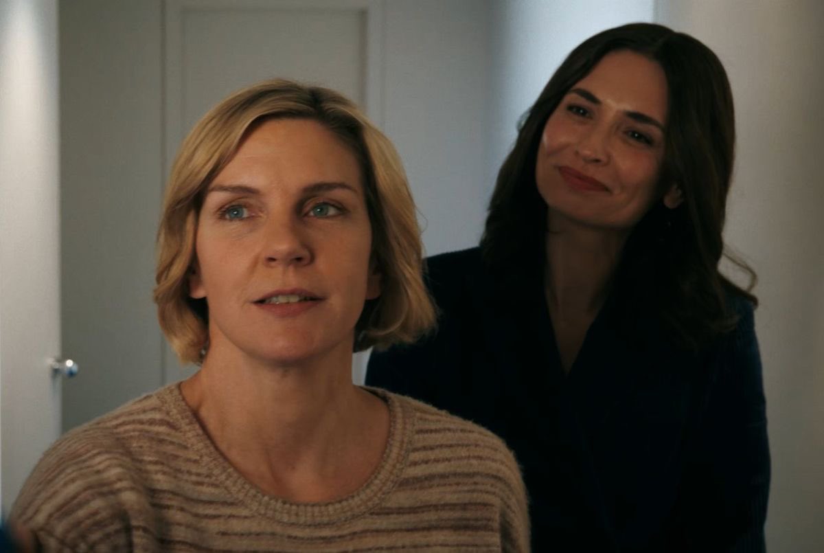 loser butch lesbian and her genius tall beautiful elegant femme behind her