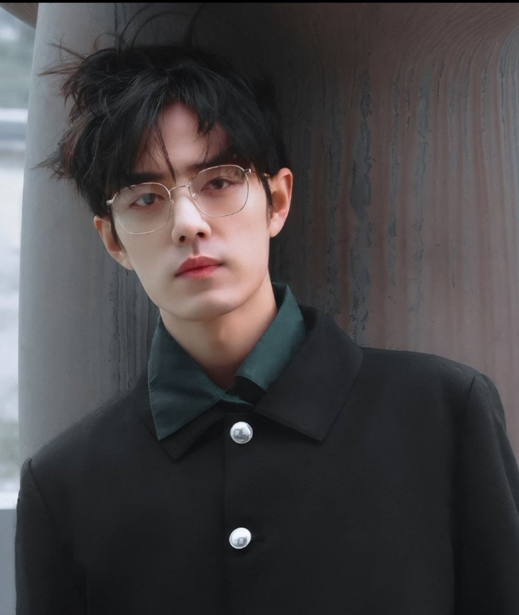 the messy hair with the glasses ... top tier