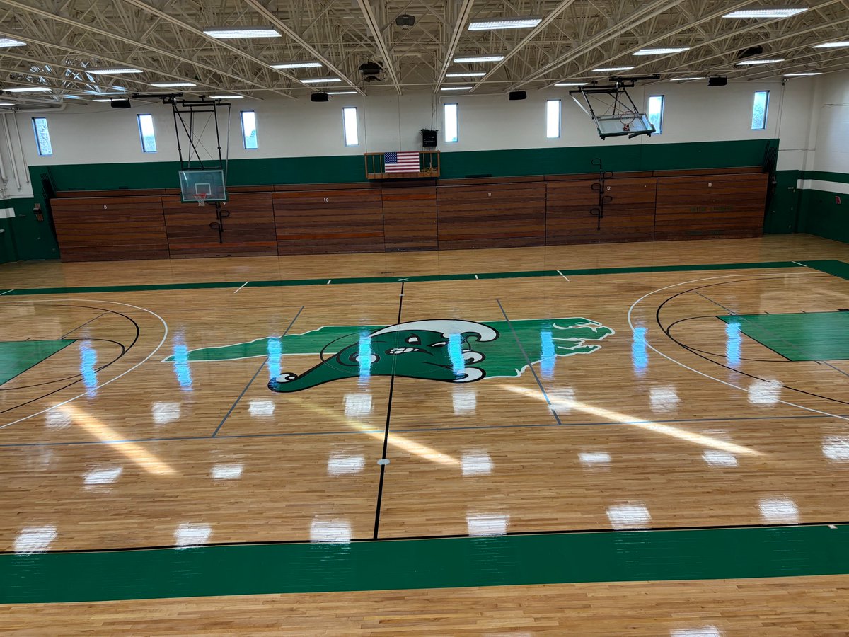 TheFloorGuys's tweet photo. Proud to share the  gym floor at Ashbrook in Gastonia, NC!
We sanded to bare wood, added lighter green stained lanes, team-green borders, and a center logo with a subtle NC stencil underneath. Finished with MFMA-approved coating for durability.
#SportsFlooring #MFMA #Athletics https://t.co/DBqJBDyfHK