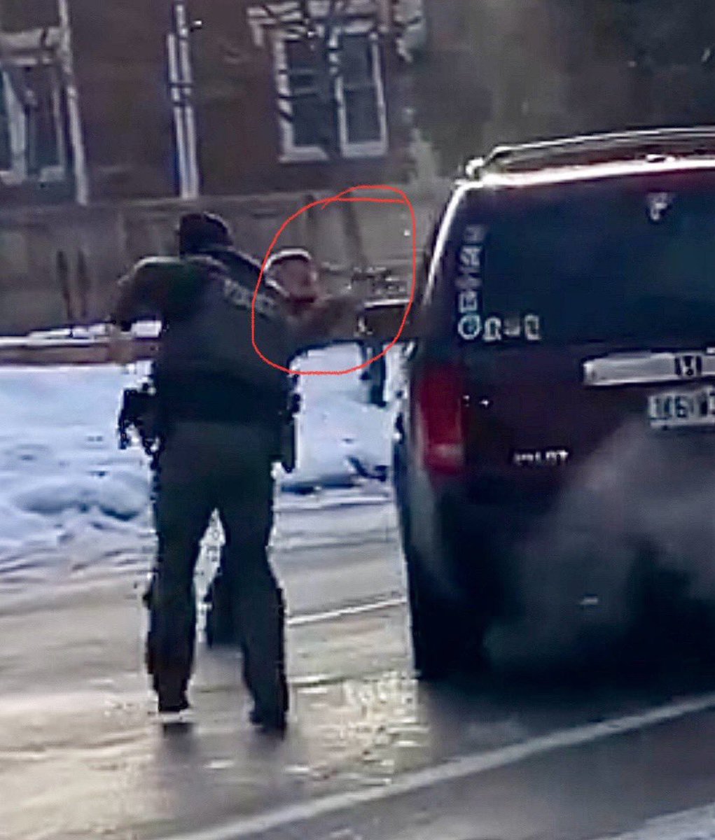 EveExamines's tweet photo. @RpsAgainstTrump This still from a video shows the guy shooting her. he's clearly beside her window and not in a position to be hit by the car. Guy is a trigger-happy idiot. https://t.co/nHAlDs0AMW
