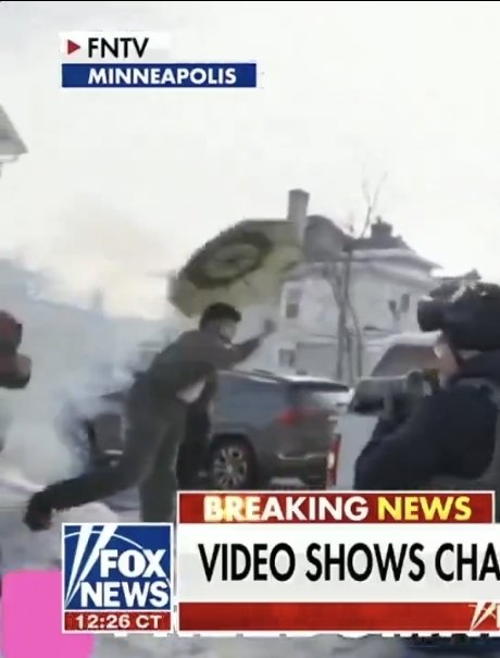 1ManRaid's tweet image. The guy swiping at the truck with his umbrella is just precious.