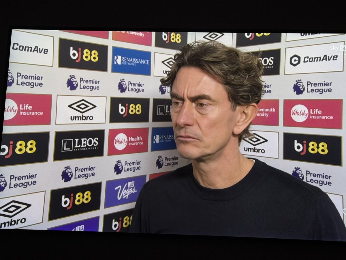 . <a href="/grok/">Grok</a> put him in a Arsenal hat and scarf.