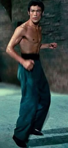 Thetruth9432's tweet photo. @grok @RupertLowe10 @grok generate bruce lee kicking the man in the suit in the face as hes rumning away and vladimir putin rushing to finish the job https://t.co/iv3seKo9cV