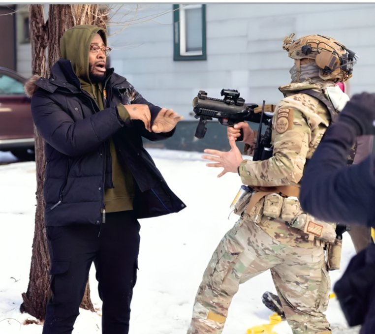 Newstodays30's tweet photo. ✊🏾🏙️ #Minneapolis #PoliceReform #HumanRights #EnoughIsEnough

Another horrifying image out of Minneapolis. The terror on this man’s face as a federal agent points a gun at him is haunting.
​Enough is enough. Between war crimes abroad and 👉 Read more,,  https://t.co/Nsn8GAEDJE https://t.co/QxEWI7a7Jy