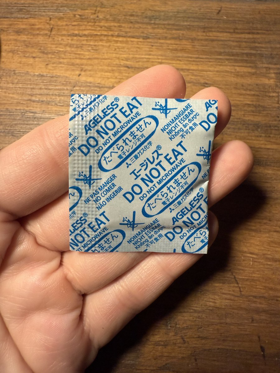 I’m assuming this is to keep the treats fresh. But why does a small package of treats need something in it that…
 
A - You can’t eat
B - It could easily break inside the package. 

If it breaks &amp; you don’t see that it has, you’re giving contaminated treats to your cat(s). This