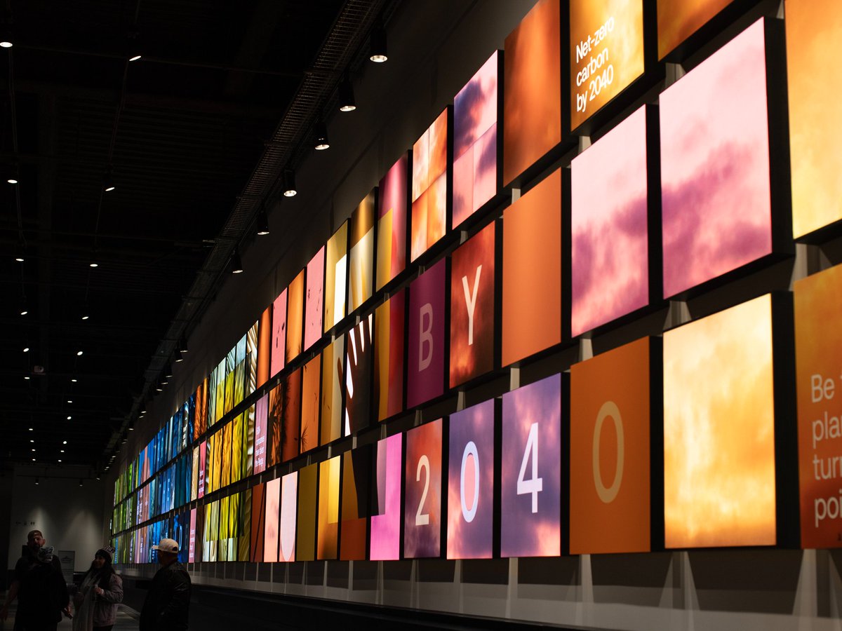 climatepledge's tweet image. The refreshed East and West walls at @ClimateArena use macro photography, motion, and layered visuals to spark curiosity and make climate action feel more accessible for the millions who pass through each year.
