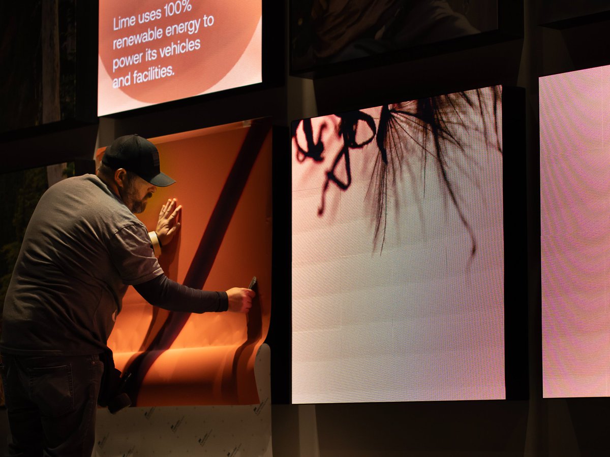 climatepledge's tweet image. The refreshed East and West walls at @ClimateArena use macro photography, motion, and layered visuals to spark curiosity and make climate action feel more accessible for the millions who pass through each year.