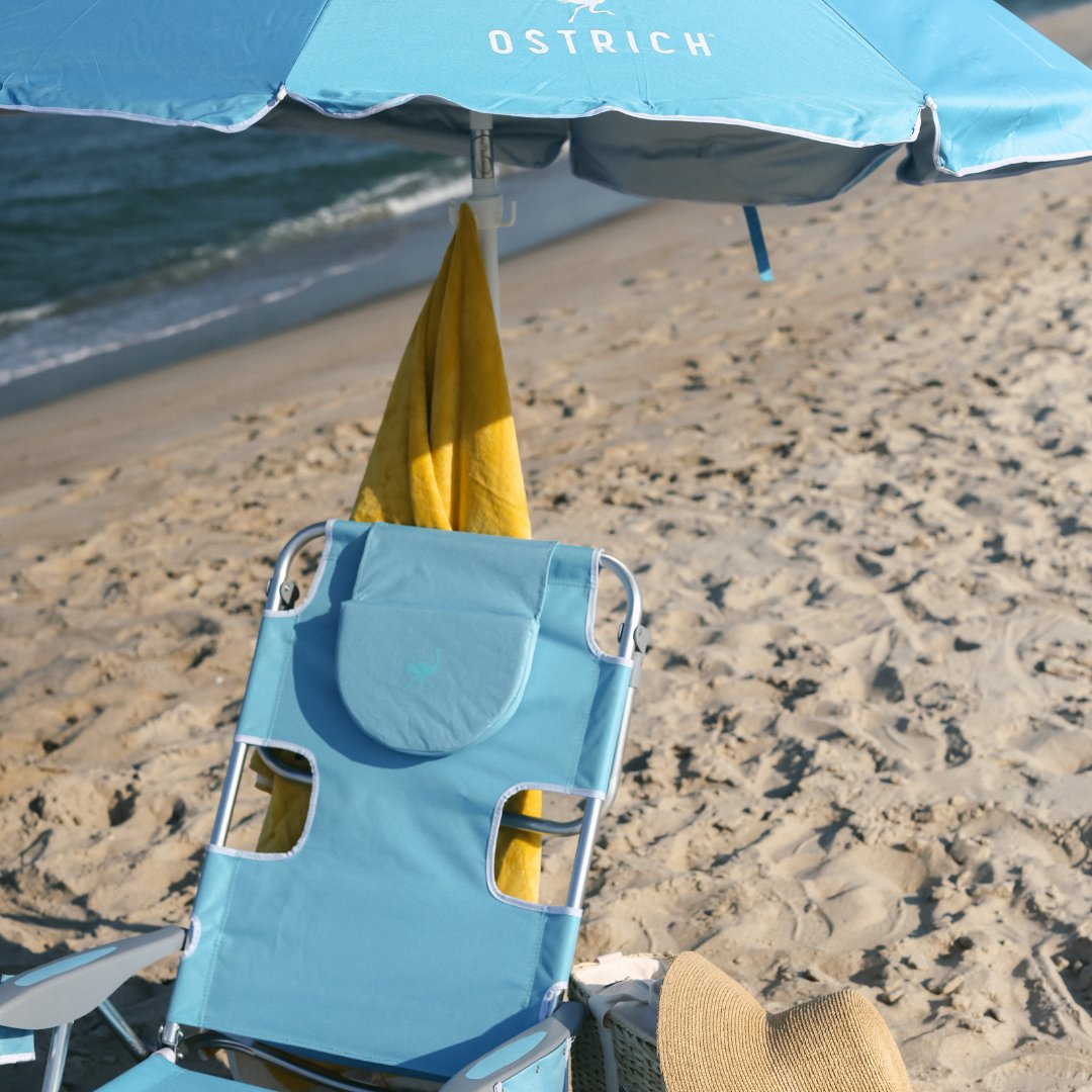 The Ostrich Umbrella provides towel hangers, 
a pinch-free push-button to lower, 
and maximum shade. ⛱️