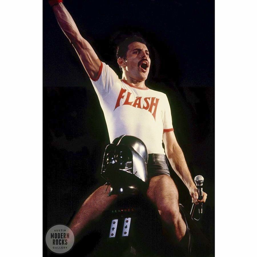 Freddie Mercury riding on Darth Vader's shoulders at a concert in Houston, Texas, on August 10, 1980. , 1980. Photo by Tom Callins.