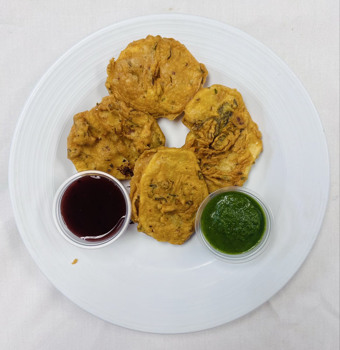 Warm Welcome with Crispy Potato Pakoras Today !

Jan 8, Thursday 

Potato Pakoras VGF
Pav Bhaji 
Veg Rice Pilaf VGF
Brown Rice VGF
Chana Masala VGF
Cream of Potato Soup GF
Vegetable Korma V
Saag Paneer GF
Chapati &amp; Papadam V

Cherry Halava V
Custard Pudding GF