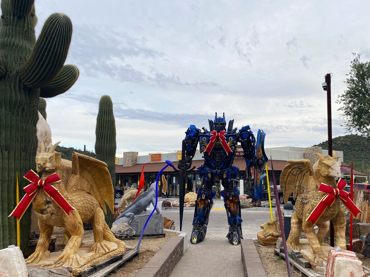 12/23/25:  Optimus Prime, all dressed up for the Cave Creek Christmas party, with his pet gryphons standing guard.  Only in Cave Creek, Arizona! 🎀🤡
"Throwback Thursday"