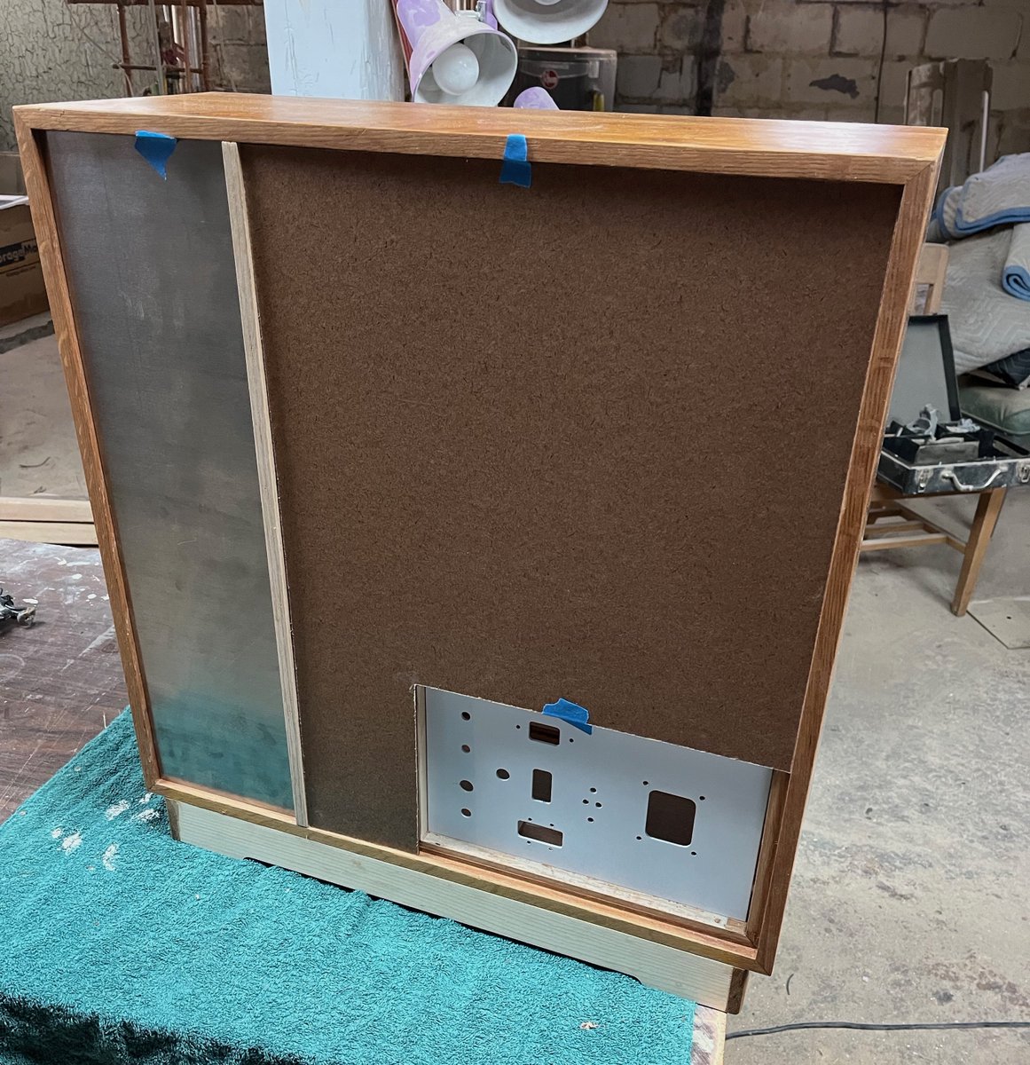 Midiizer's tweet photo. Buchla 100 build - rear of case w/ rear panel for the Patchboard Module 124 and power supply. https://t.co/RBydxdKf2M
