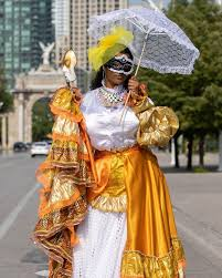 jelinthemix's tweet photo. @Selinecurls @MrStitch_BCG GO DOWN is a song that tells a tale of how a young boy fell in love with Carnival and Soca music from the first time he saw a Dame Lorraine (a traditional mas character) dance.

It's not his actual Aunty. I wish D1 was on Twitter to explain this better than me. https://t.co/HQHW85FcmZ