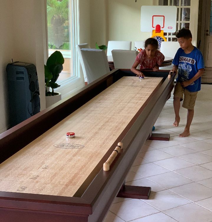Shuffleboard is a game that is fun for all ages. If you can see over the table you can play. At McClure Tables we handcraft our tables to be family heirlooms. Using select locally harvested hard maple on most of our cabinets and all playboards.