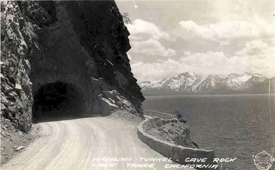 A beautiful photograph of Cave Rock on the eastern shore of Lake Tahoe. What's cool is you can see the original road that went around the Rock at right. In the 1860s,  a wooden trestle bridge was built, supported by stone buttresses and a rock retaining wall along the west side