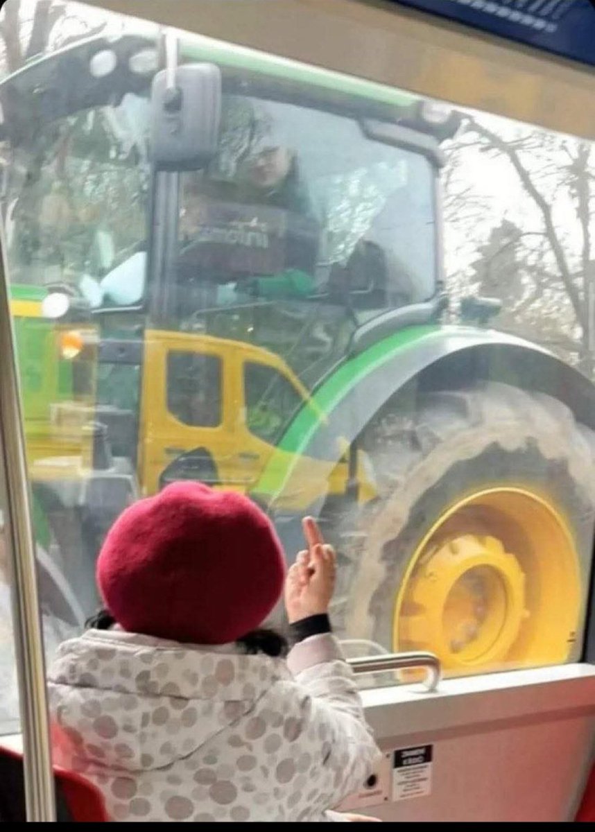 Nomination for World Press Photo 2026 award:
"Polish peeple in Warschau greeting rich farmers protesting against European Union in their expensive John Deeres purchased from European Union subsidies".