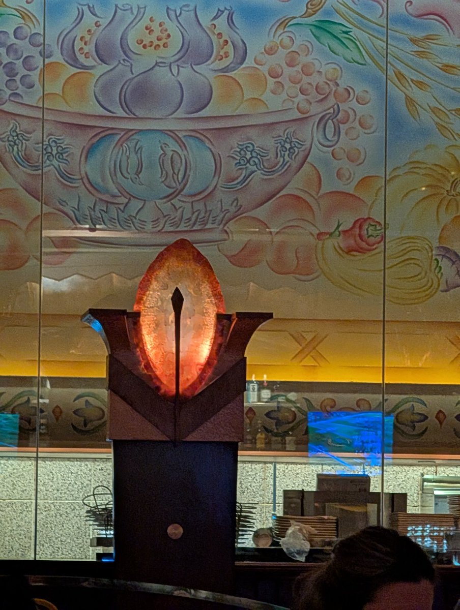 bdfdillon's tweet image. Why is the decoration at cheesecake factory looking at me like the tower of barad dur