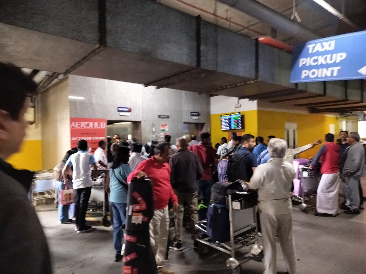 ramask's tweet photo. Crazy queue at @aaichnairport to get a cab.small elevator, poor management. it's 30 mins since landing but nt close to boarding the cab. on a sat morning..which isn't peak load.. Shame @AAI_Official @aaichnairport .. nothing changes @RKRadhakrishn @OMRcat @SunithaSekar https://t.co/ZZ6xLc95YW