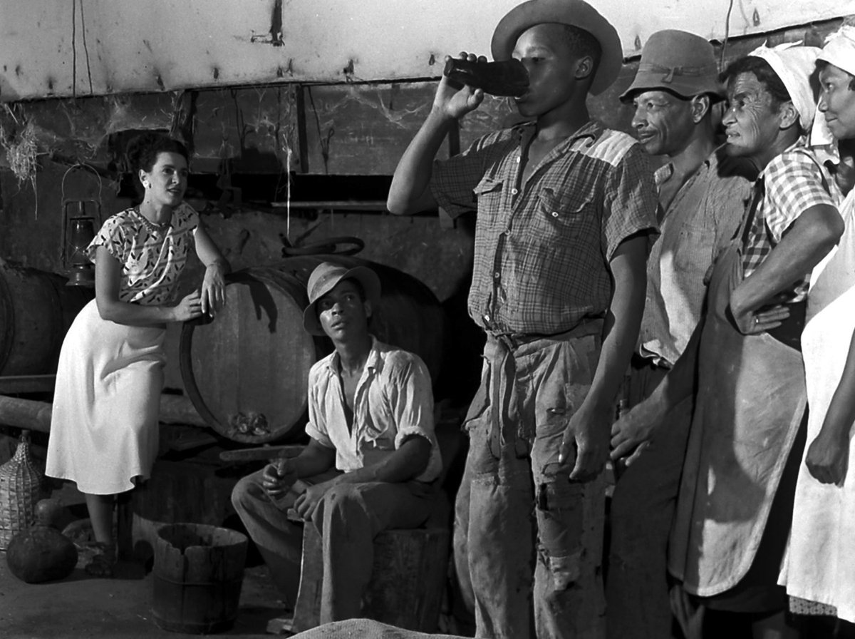 HistorySAZAR's tweet image. Farm worker drinks his "tot," the wine that comprised part of his wages and also led, for many, to alcoholism, Cape Province, c 1950. Photo: Margaret Bourke-White—The LIFE Picture Collection