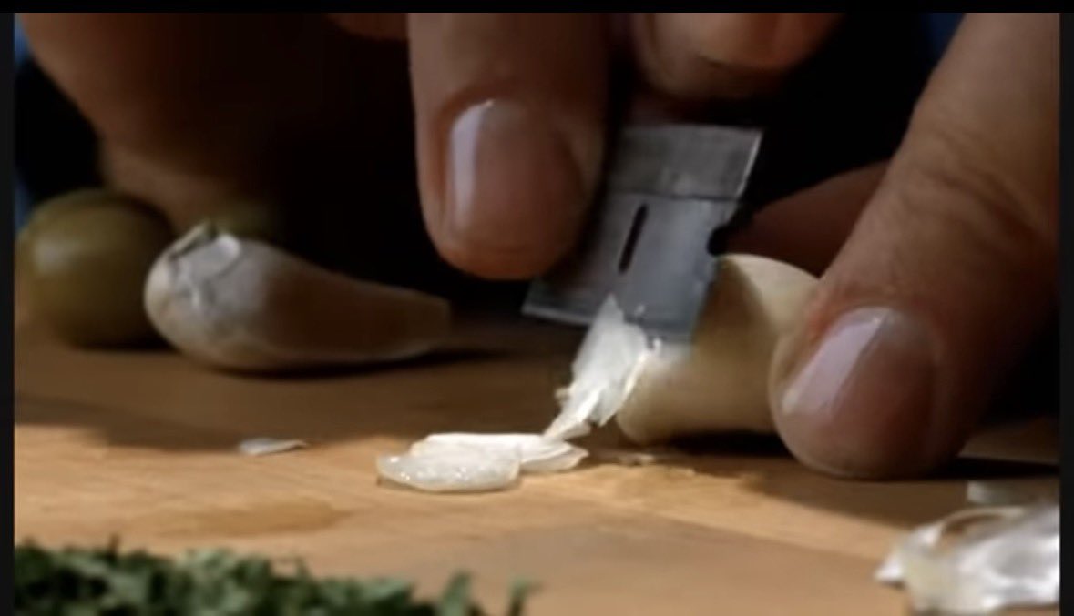 Vic Fangio prepping for his famous meatballs. 

Some players feel like he uses too many onions in the sauce.