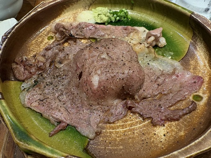 肉の海に米が沈んでいる 