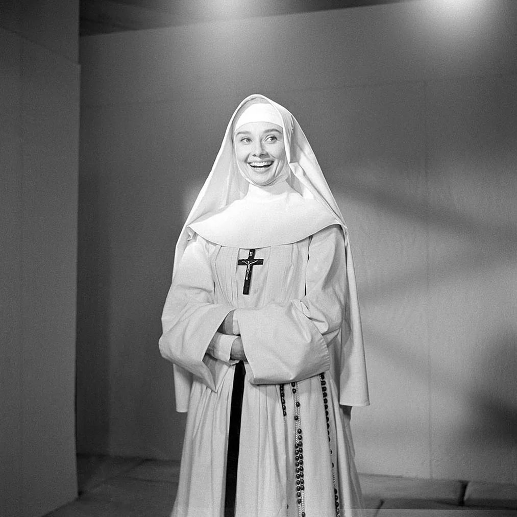 Audrey Hepburn photographed behind the scenes of "The Nun's Story" (1959).