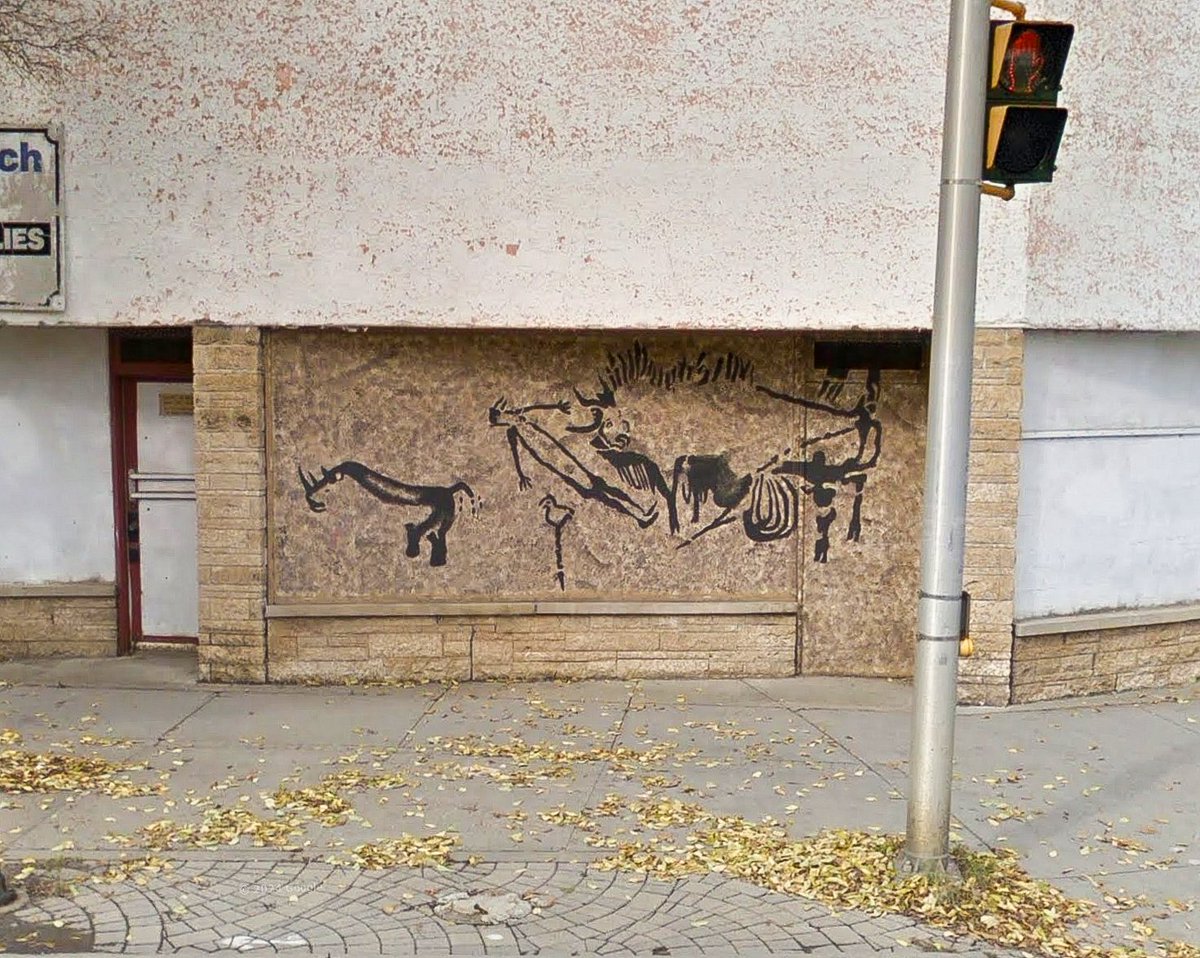 Dub__A's tweet image. Lascaux Cave Painting graffiti on an abandoned building in Thunder Bay, Ontario