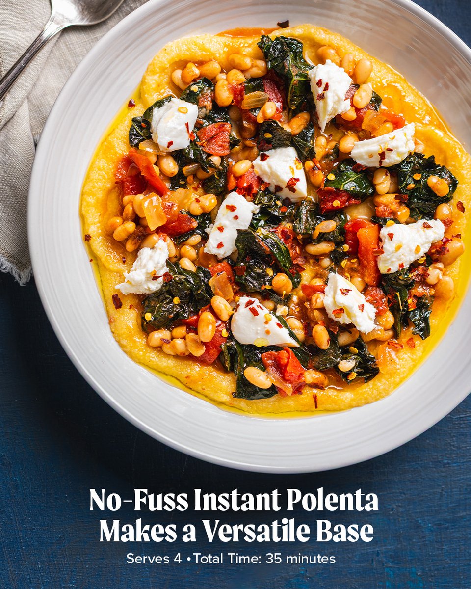 TestKitchen's tweet image. Instant polenta becomes something special when it’s built on garlic- and chile-infused olive oil and topped with a hearty sauce of fire-roasted tomatoes, kale, and white beans. Cozy, spicy, and perfect for a low-effort dinner. Find the recipe: cooks.io/4jtV9o1