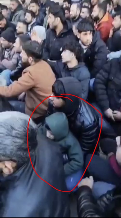 kurdistannews24's tweet image. A detained child appears among the Kurdish detainees in the clip ( left )by the terrorist Golani militias, and they are described as 'sheep' in the Al-Sheikh Maqsoud neighborhood in #Aleppo Syria