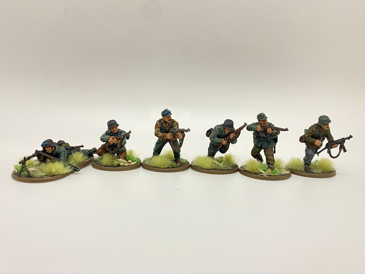 One unit of Volksgrenadiers for Konflikt ‘47 is complete. Using the DAK sprue Warlord Games sent with the rule book, I opted to paint them with various bits of uniform/camo as though they were scraped together and kitted with whatever was available.

Should add to the weirdness