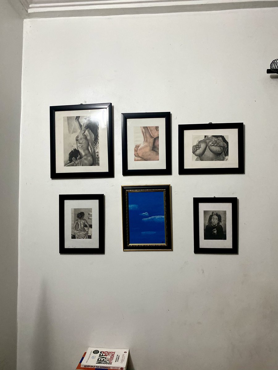 OzoezeM's tweet photo. Everywhere I turn in my crib, my art is there. 13yo me would think I’m so cool https://t.co/h73YzLh84E
