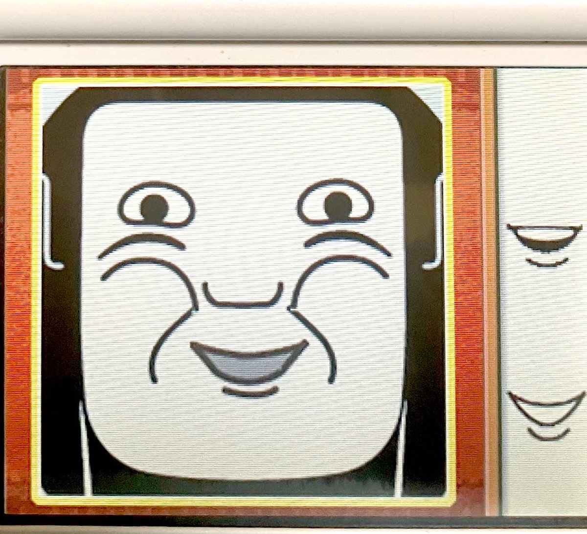 正月遅れの福笑いをば