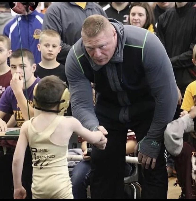 MrTestoestrogen's tweet photo. Brock Lesnar shaking hands with the kid who won against his son https://t.co/hQRZD2iHsD