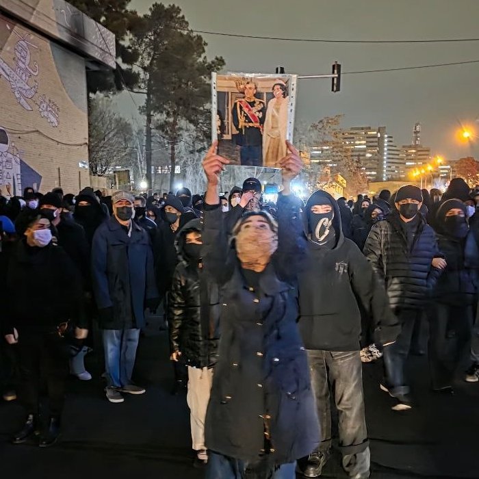 This photo might not be as cool as the ones burning Khamenei's picture with cigarettes outside Iran, but it shows something more than just being cool.

It shows the courage of a girl who is raising a photo in IRAN that could get her shot.

This photo deserves full media